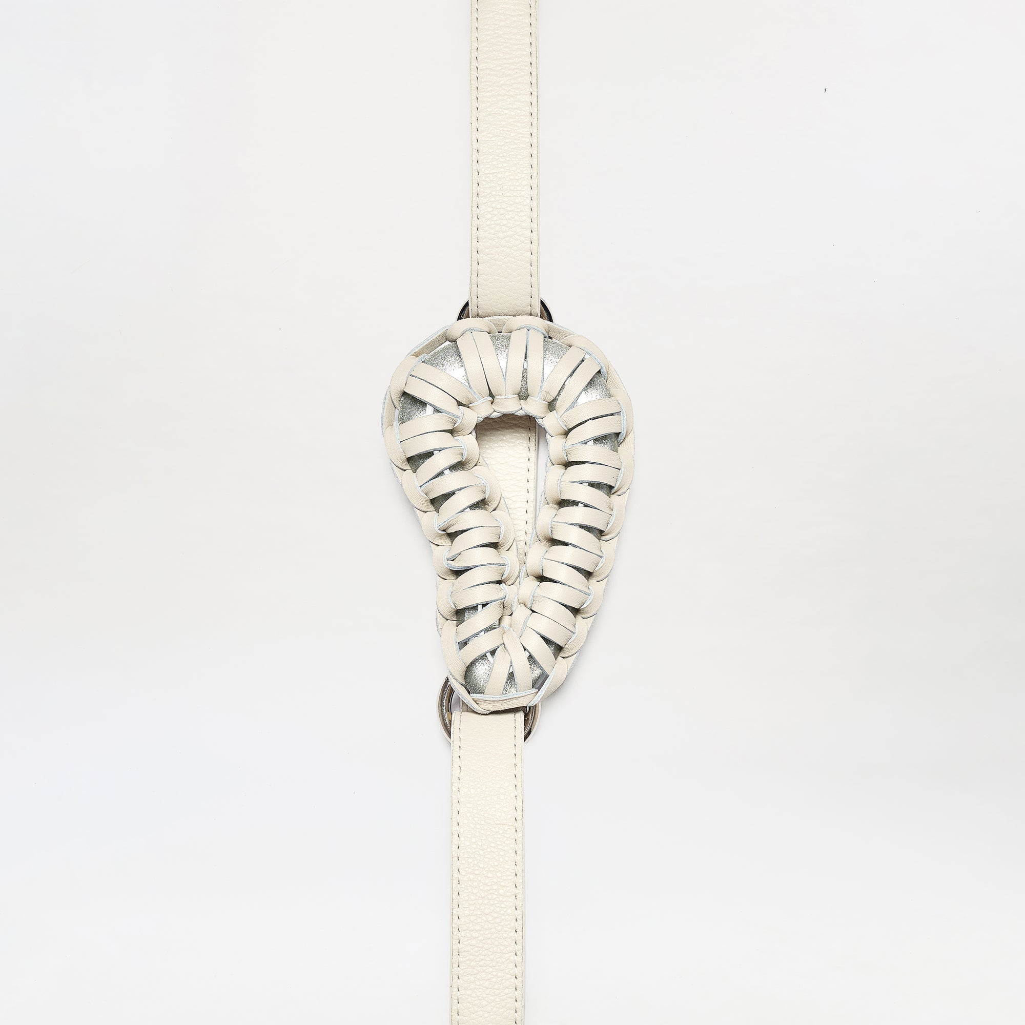 The Renata Belt is a cream-colored, intricately woven leather accessory featuring a looped oval center, shown against a plain white background.