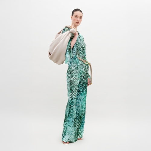 Wide-leg high-waisted Andie Pant Emerald Animal Print, displayed against a plain white background. Available for pre-order now, with delivery starting November 15, 2024.