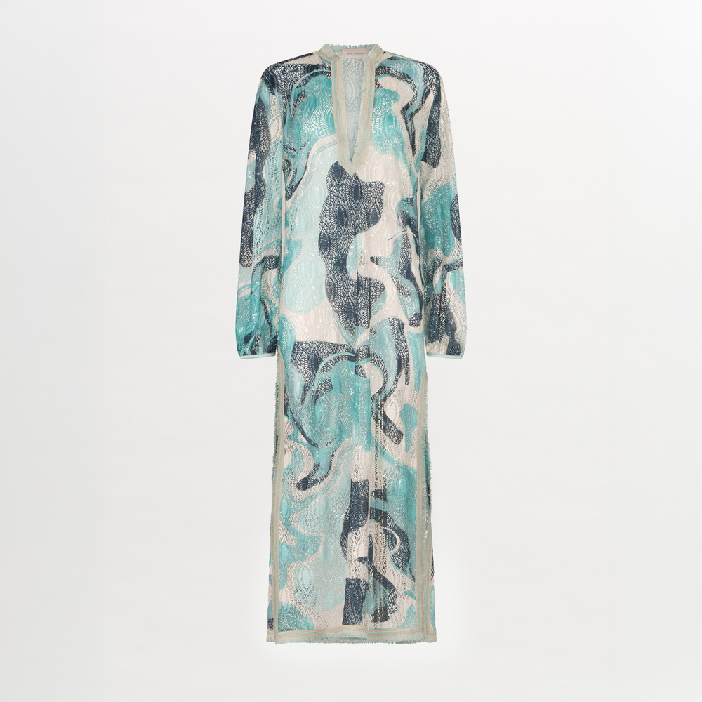 A long Akira Tunic Turquoise Marble with a multicolor abstract print.