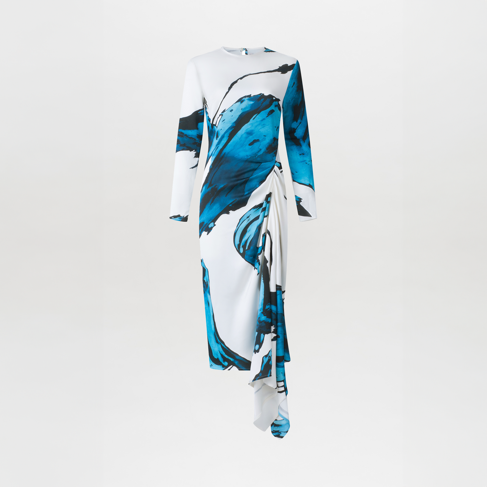 Ananya Dress Multi Abstract Waves with bold blue abstract print design, featuring an asymmetrically draped skirt, displayed on a white background.