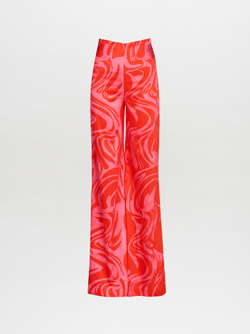 A high-waisted Andie Pant Pink Red Marble in a wide leg style.