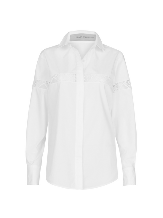 A white Andrea Shirt White with embroidery detail.