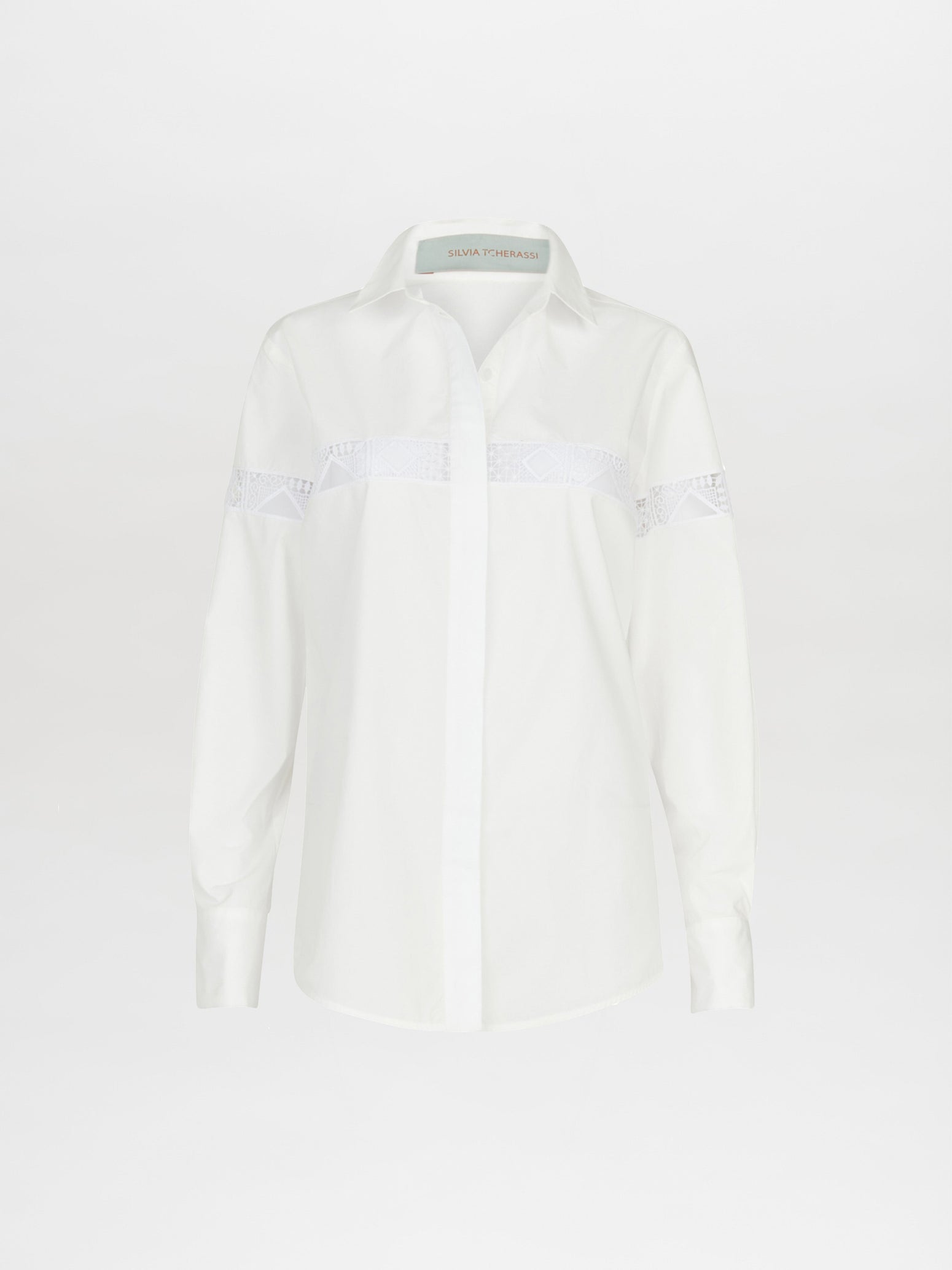 A white Andrea Shirt White with embroidery detail.