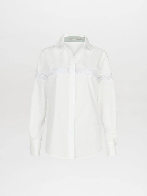 A white Andrea Shirt White with embroidery detail.