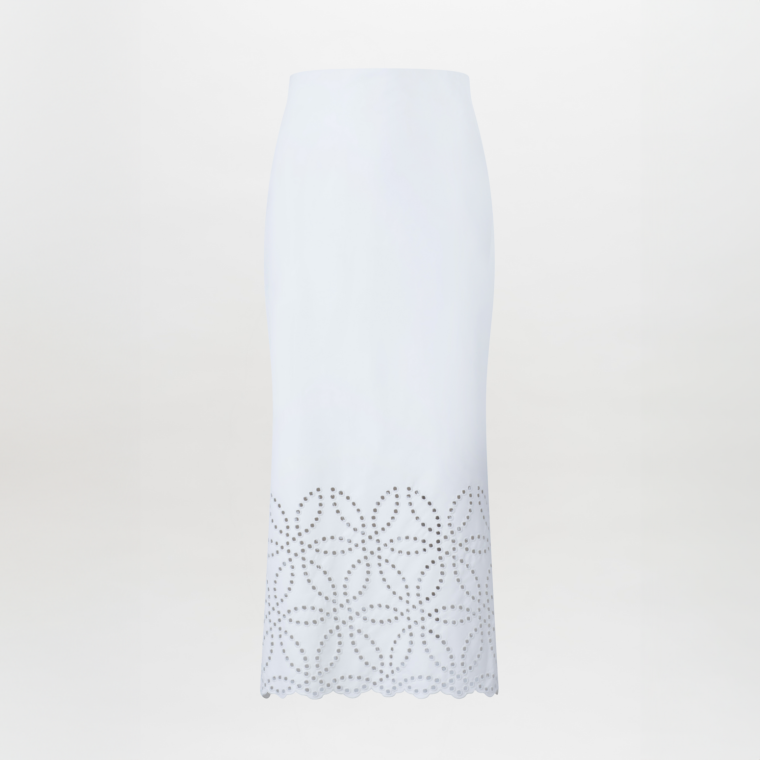 Atira Skirt Pearl high-waisted midi skirt with laser-cut floral hem design, isolated on a white background.