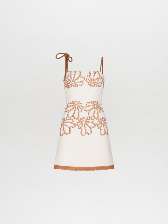 A Balerina Dress White Cacao Eyelet with orange embroidery and spaghetti straps.