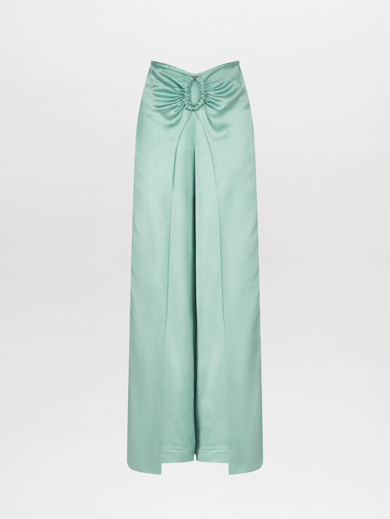 Introducing the Belma Pant: a long, teal skirt-inspired pant with a high waist and wide leg silhouette, highlighted by a central pleat and a gathered design at the top.