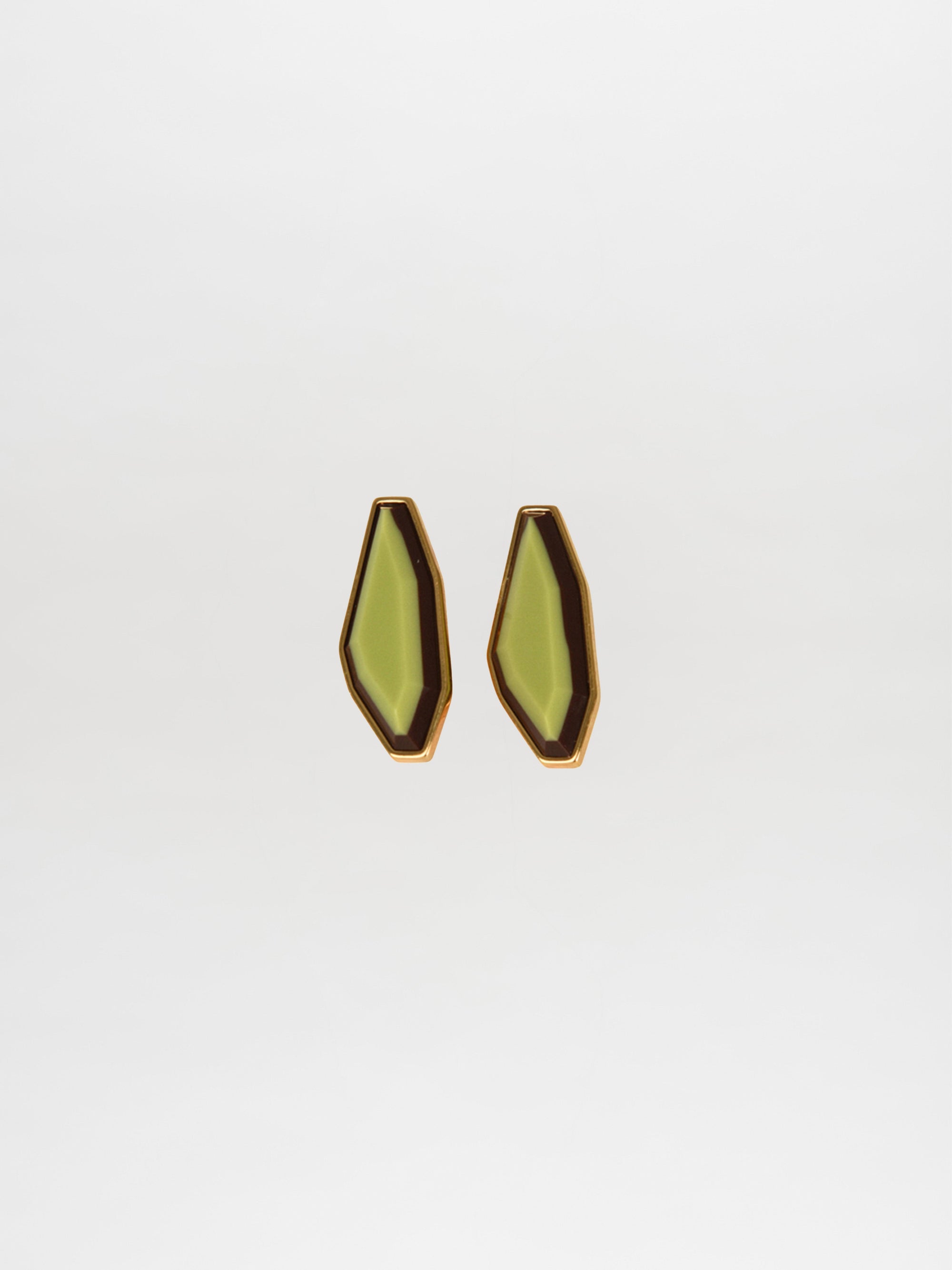 A pair of geometric Badra Earrings Lime with gold trim and faceted fantasy lime-green centers, shown on a plain white background.