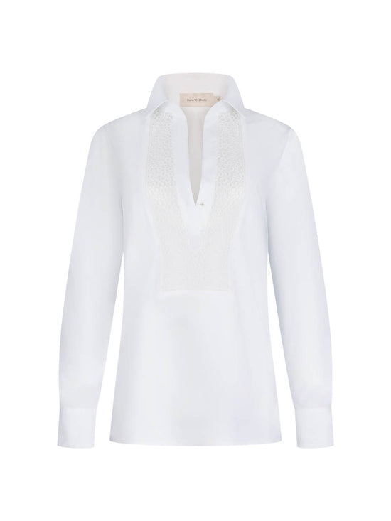 Bega blouse white with a lace-detailed collar and v-neckline on a plain background.