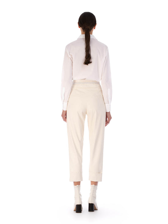 Bega blouse white with a lace-detailed collar and v-neckline on a plain background.