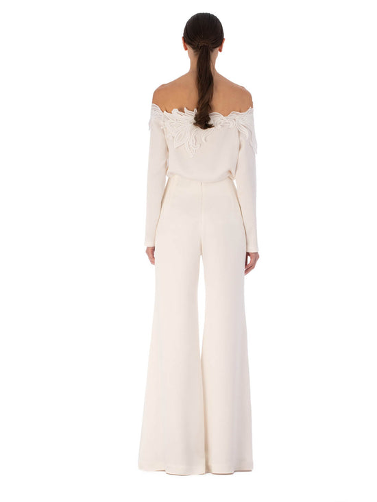 Palermo Pant White-colored high-waisted palazzo pants with a hammered texture fabric on a plain background.