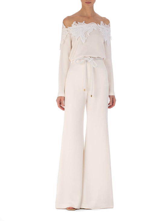 Belinda Blouse White with ornate Guipure lace detailing on the shoulders and cut-out accents, displayed on a plain background.