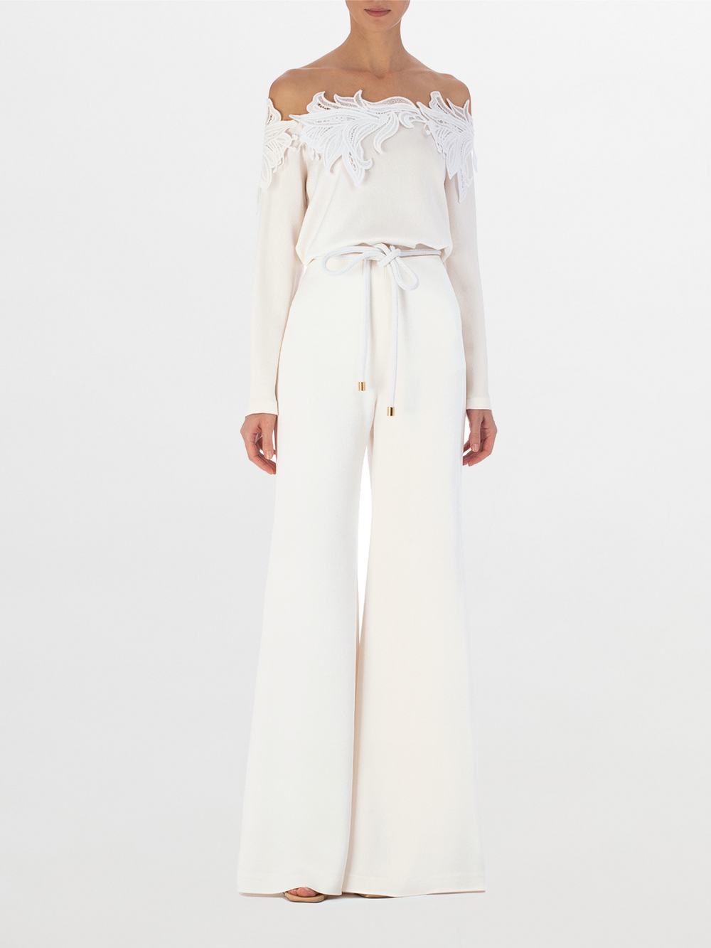 Belinda Blouse White with ornate Guipure lace detailing on the shoulders and cut-out accents, displayed on a plain background.