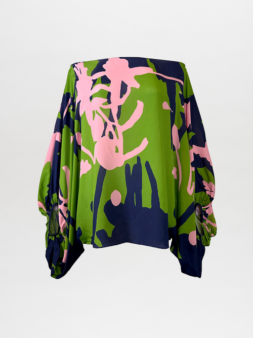 A figure-favorable Bellagio Blouse Verdi Pink Blossom Burst with a romantic sleeve.