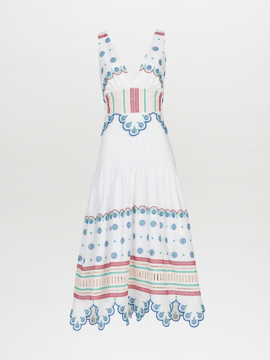 A Biset Dress White Blue with colorful embroidered details.