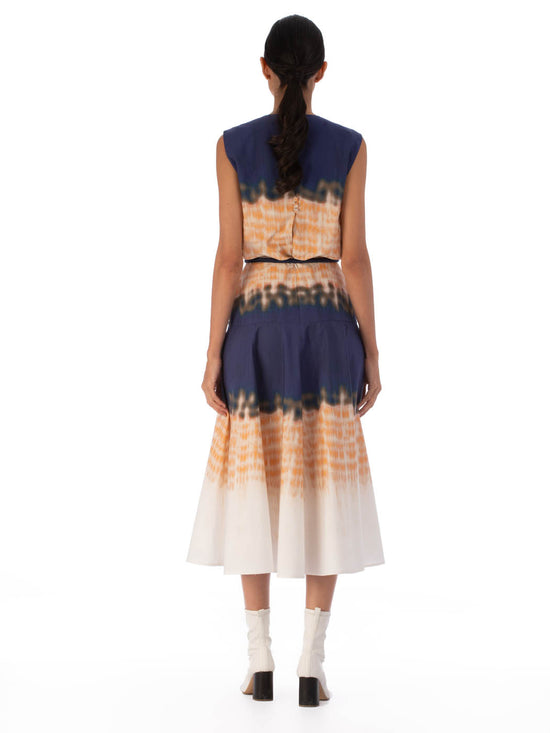 Bora Dress Mediterranean Coral Blue with abstract multicolor print, featuring a keyhole neckline and a navy belt.