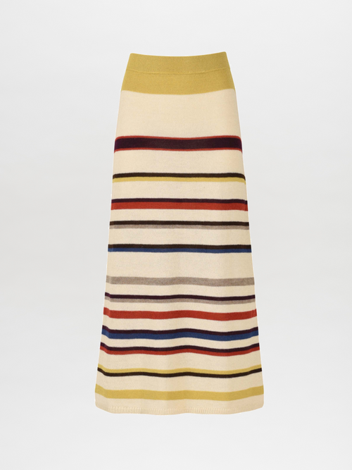 A person wearing the Brie Skirt in Multi Mustard Stripe, paired with strappy sandals, enjoys the comfort of sustainably dyed fabric.