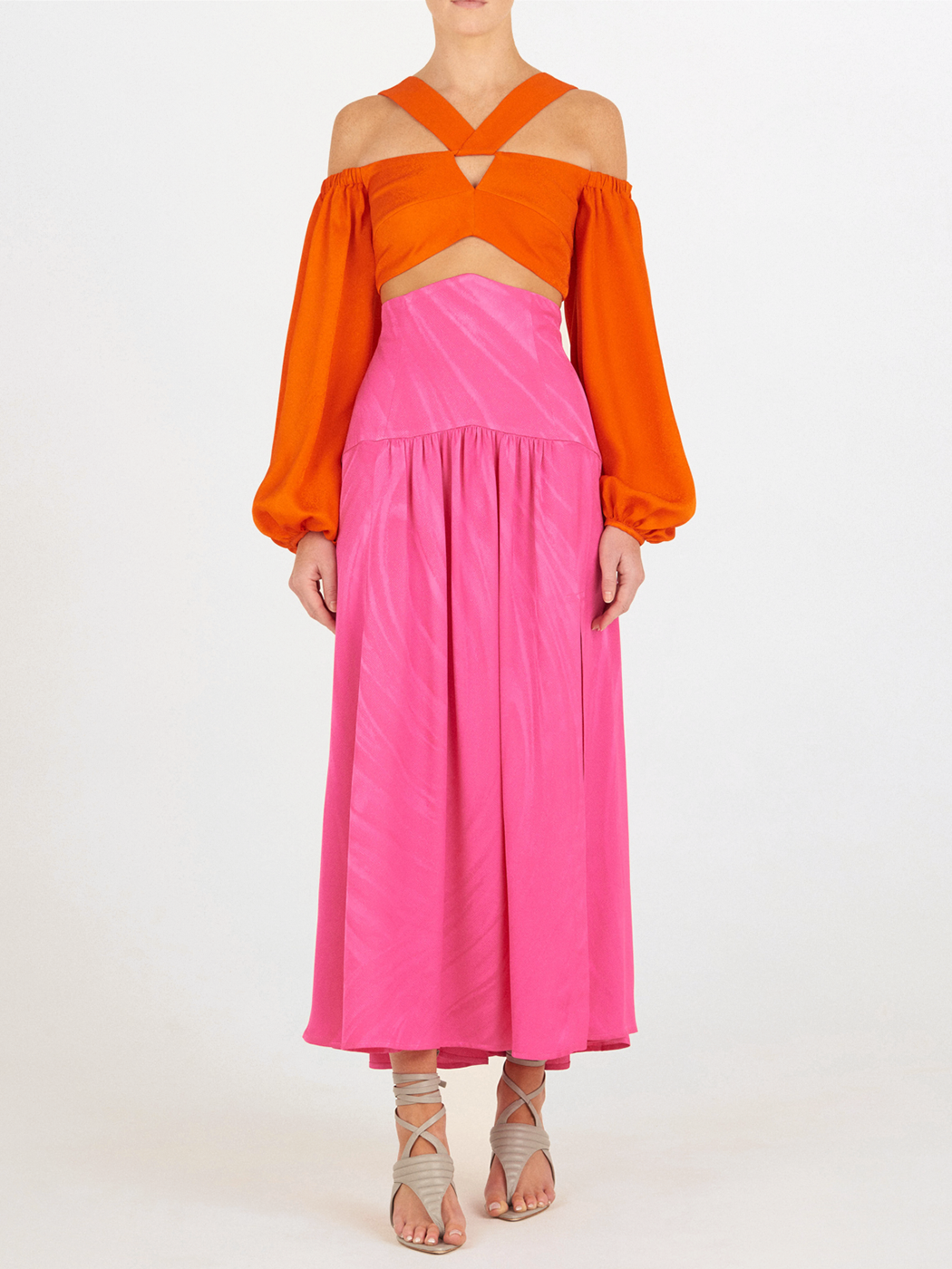 Bright pink sleeveless dress with a high neckline and a full-length, Callie Skirt Fuchsia, displayed on a white background.