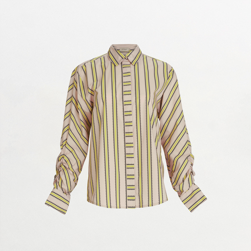 The Caritina Blouse is made from 100% Italian cotton with beige, yellow, and dark green stripes. It features a collared neckline and stylish ruched long sleeves.
