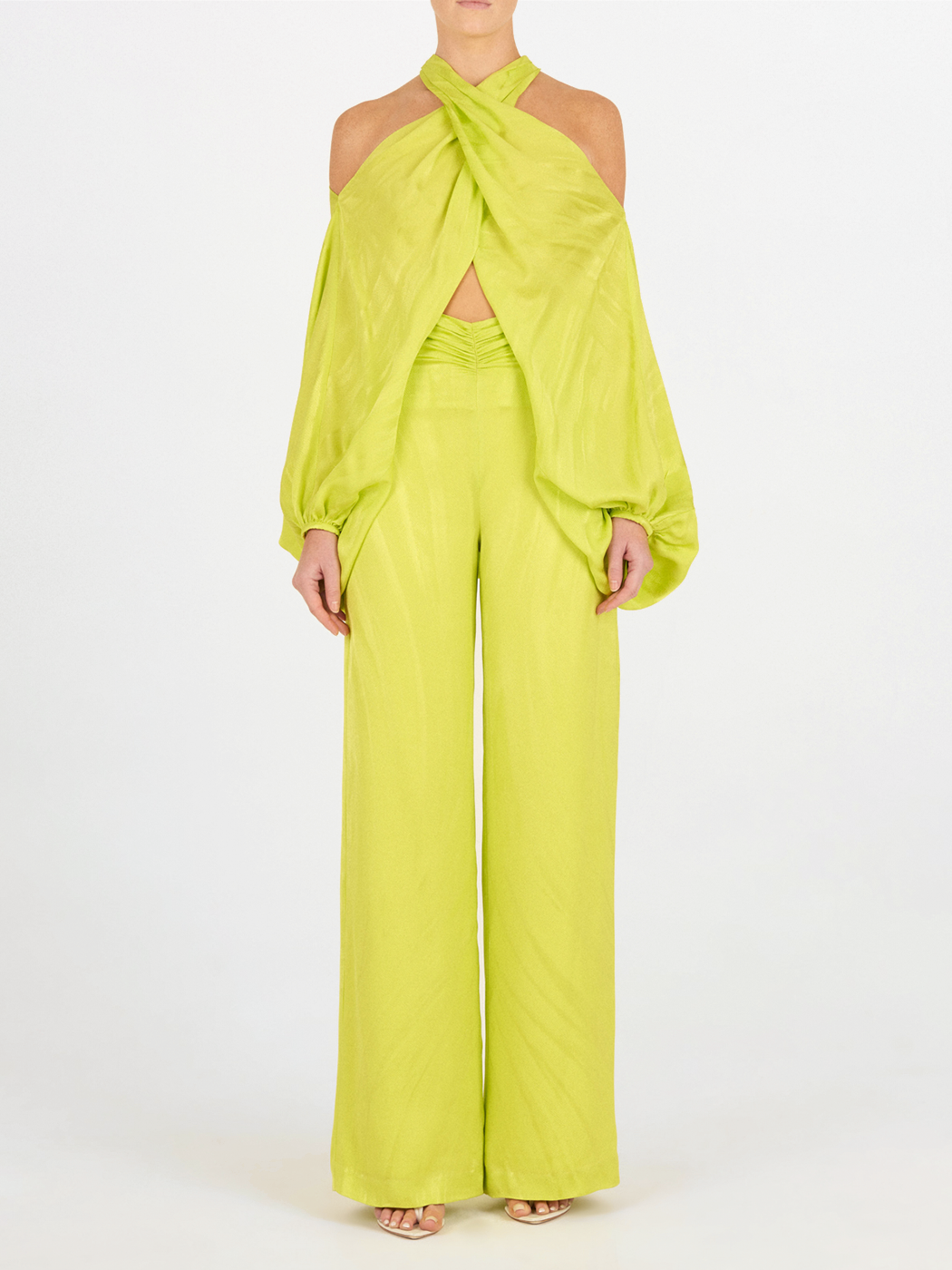 A woman's Casey Pant Verde Lime, wide-leg, flattering drape pants.