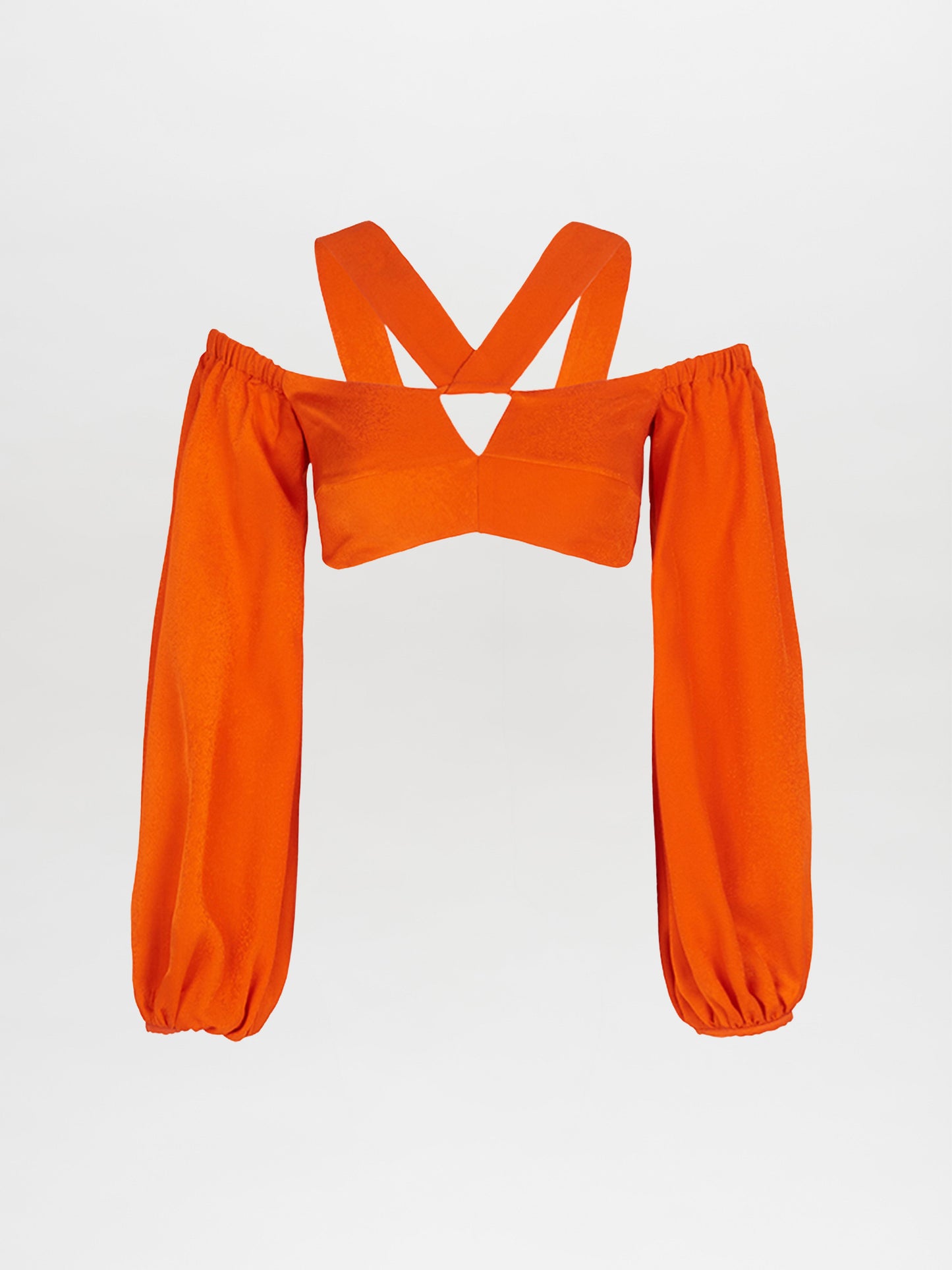 Carole Top Bright Orange off-the-shoulder crop top with billowing sleeves and a cross-body strap design, isolated on a white background.