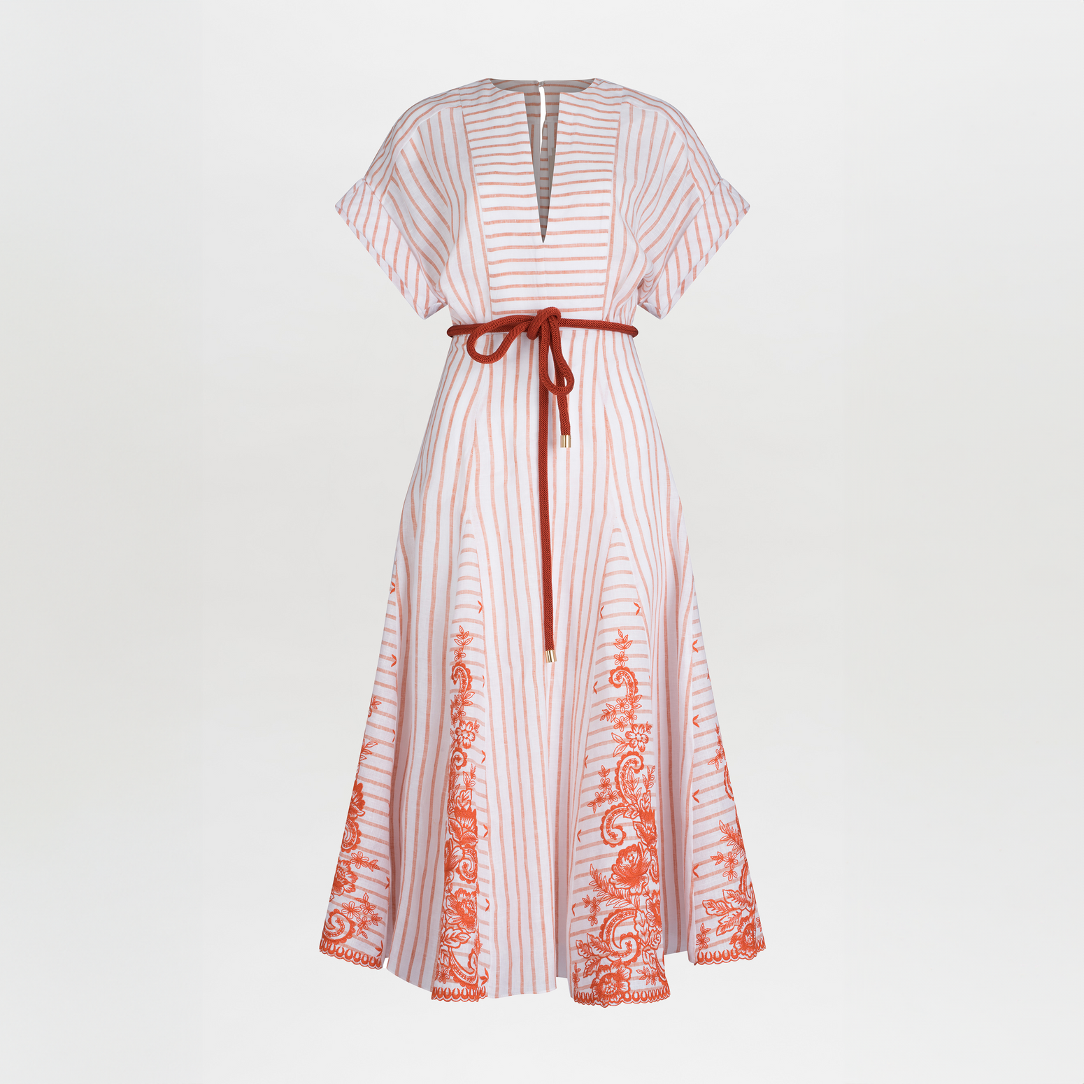 Casandra Dress Coral Paisleys Stripes with short sleeves and a v-neckline, accented by a red drawstring waist and ornate patterns along the hem.