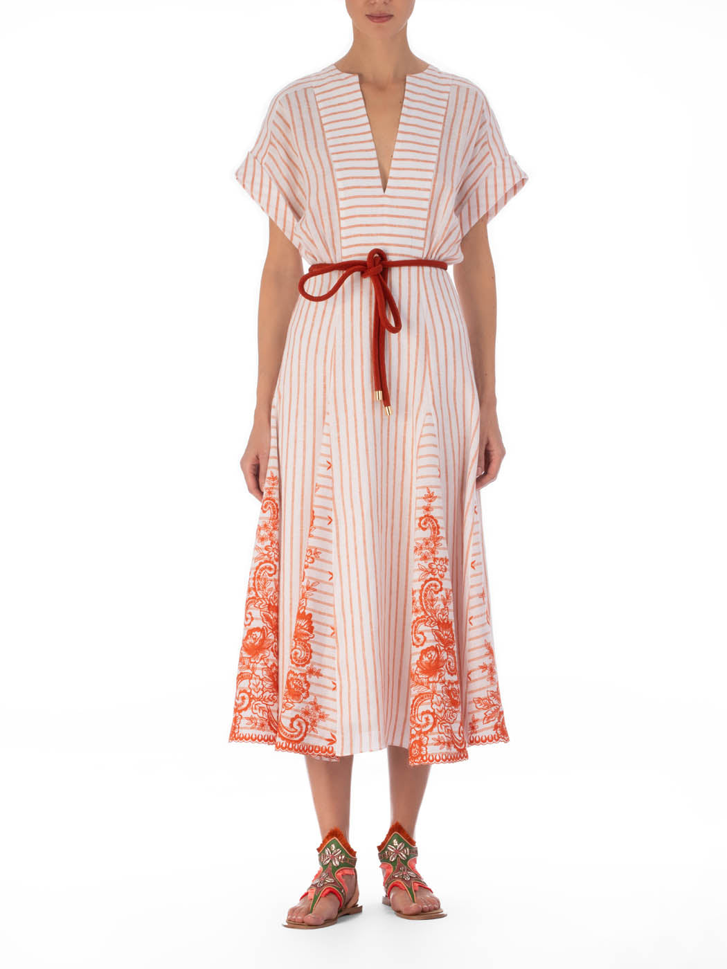 Casandra Dress Coral Paisleys Stripes with short sleeves and a v-neckline, accented by a red drawstring waist and ornate patterns along the hem.