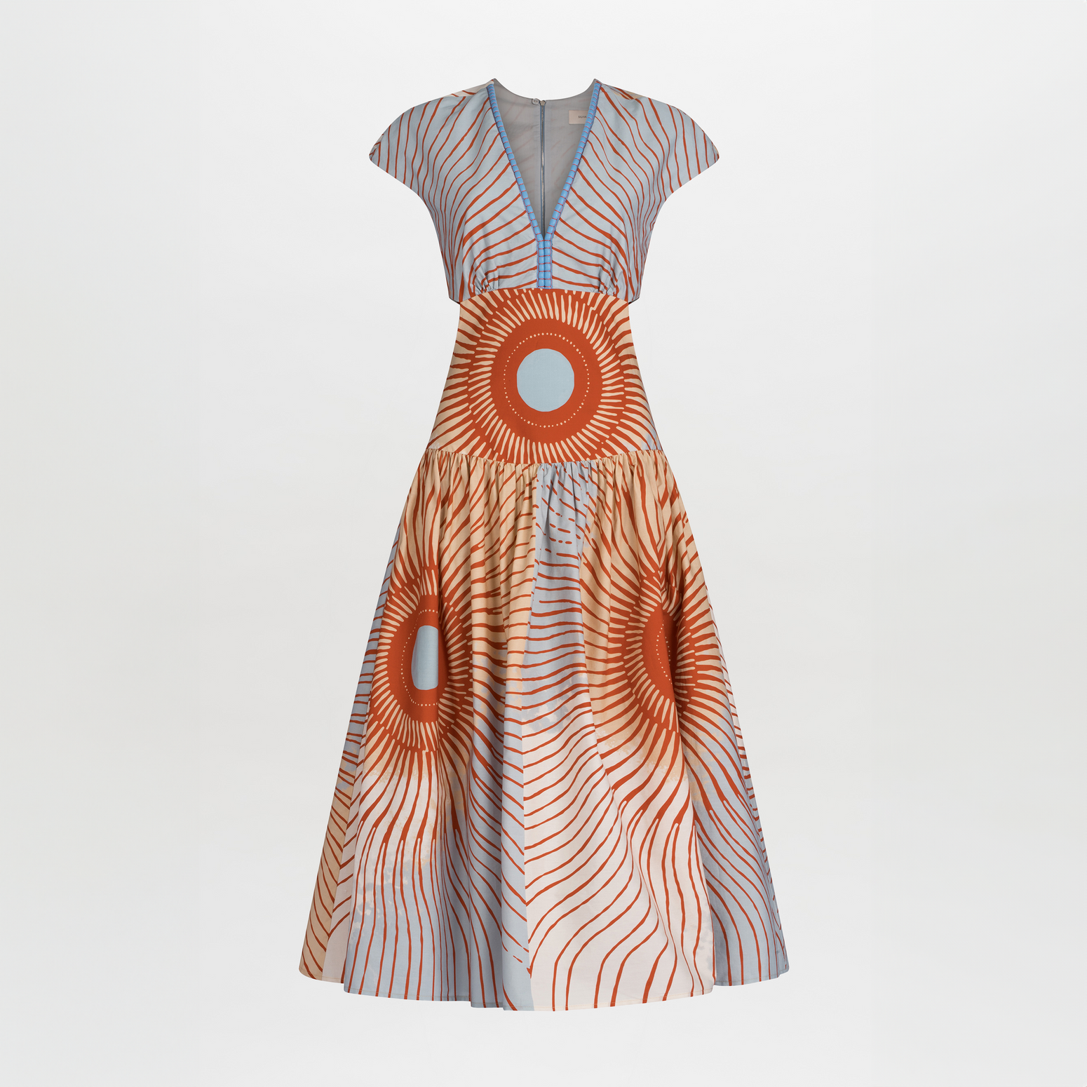 Displayed on the mannequin is the enchanting Cecile Dress Sausalito Sunset, featuring exquisite cutout details and a vibrant multicolor pattern that is sure to turn heads.