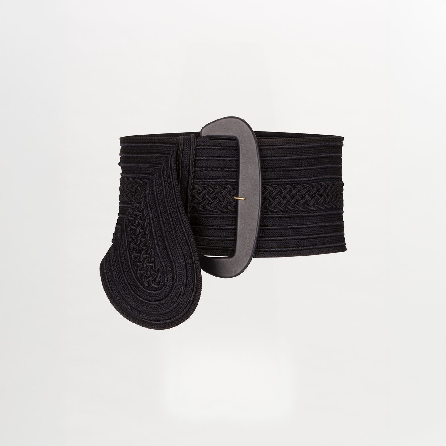 The Chenoa Belt is a wide black rayon accessory featuring an oversized oval buckle and decorative braided details, shown on a plain white background.