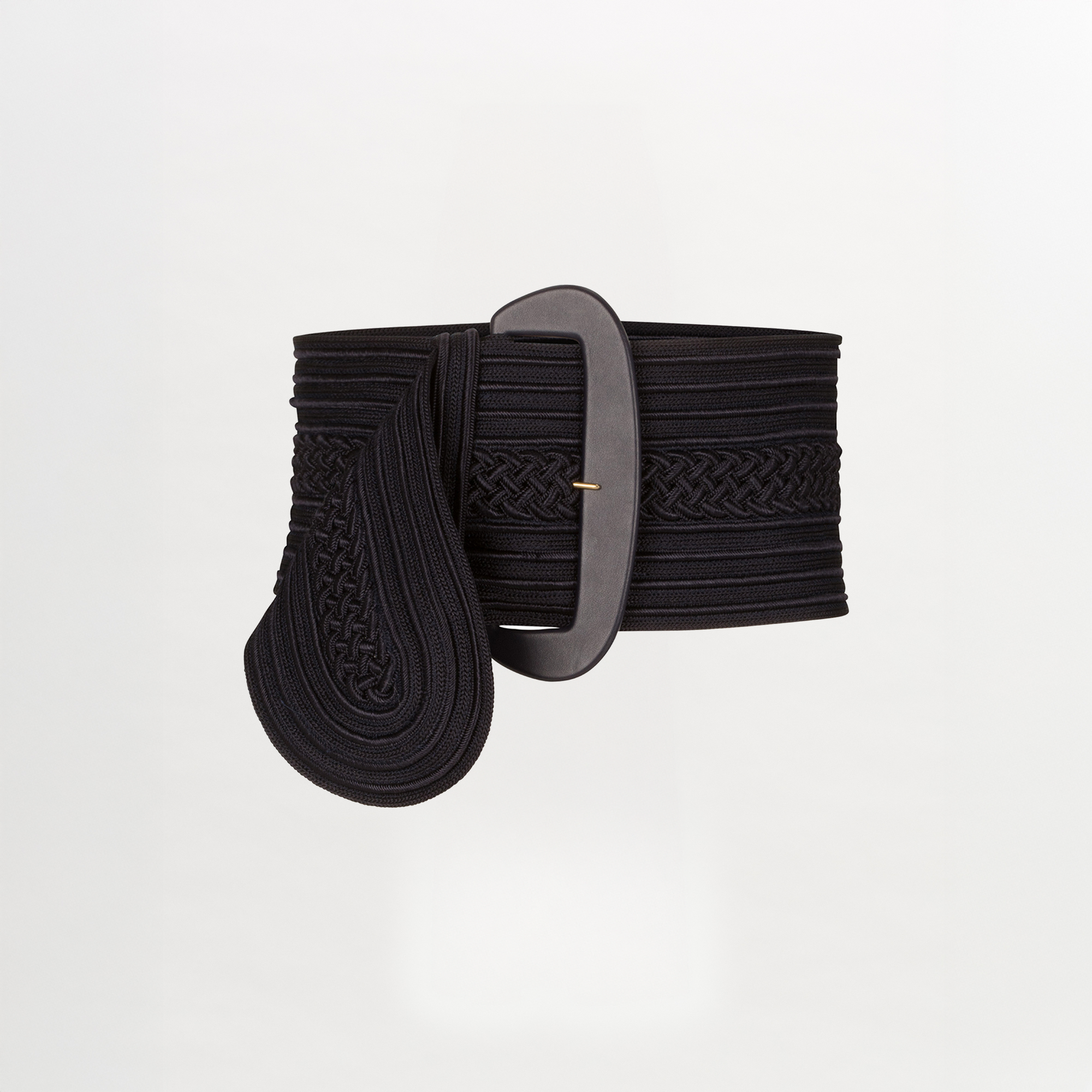 The Chenoa Belt is a wide black rayon accessory featuring an oversized oval buckle and decorative braided details, shown on a plain white background.