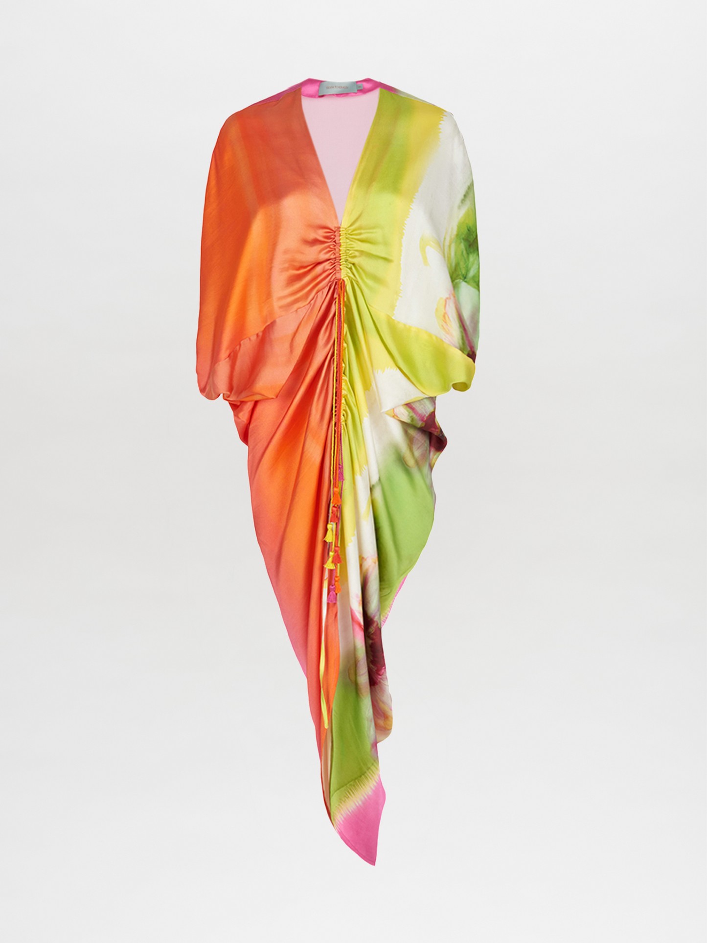 A versatile, colorful silk scarf with a Cloister Dress Floral Gradient Rainbow print on a mannequin.