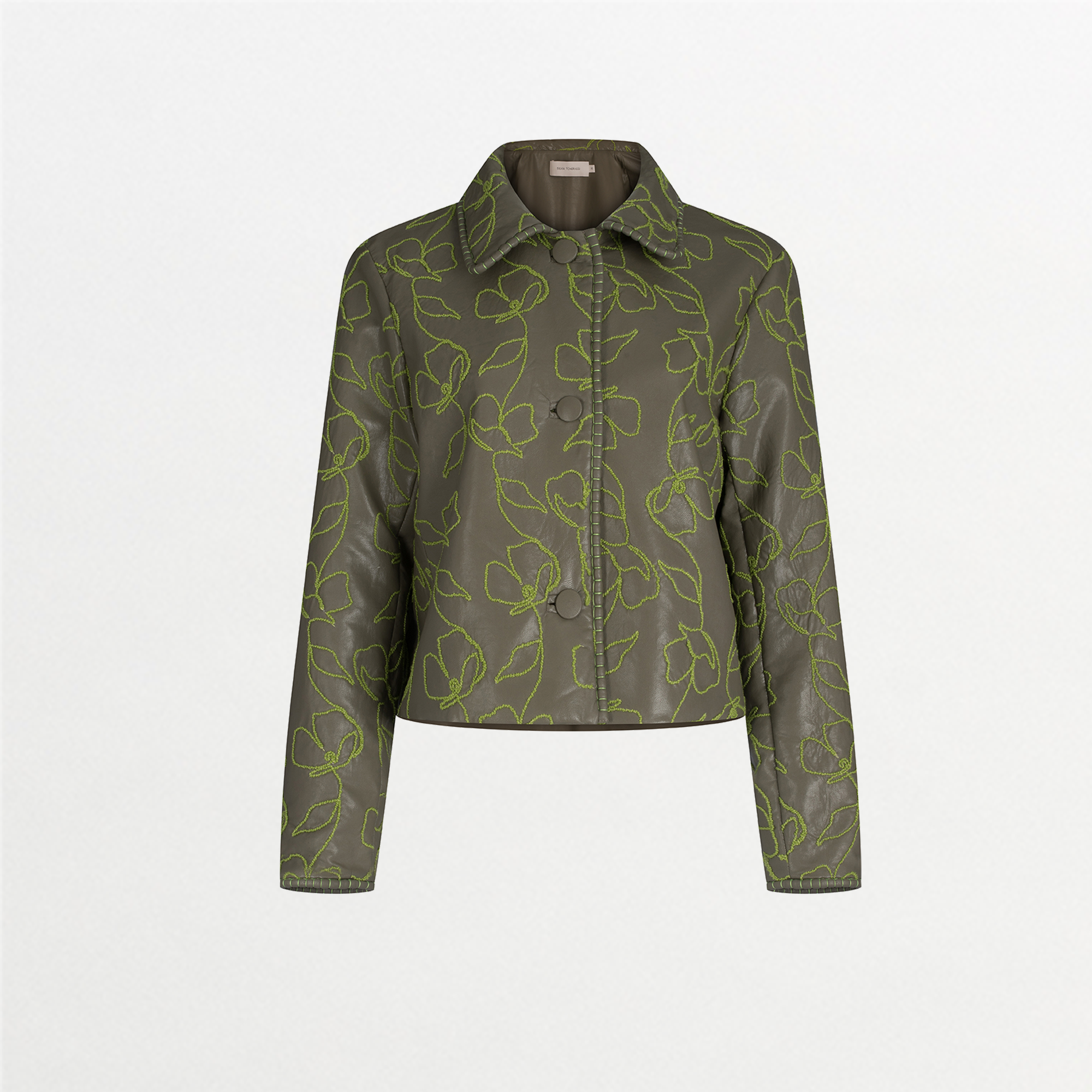Explore the Columba Jacket in Forest Green, crafted from embroidered ecoleather. It showcases lime green floral embroidery, a chic collar, a button-down front, and long sleeves for an elegant mix of classic style with striking embroidery.