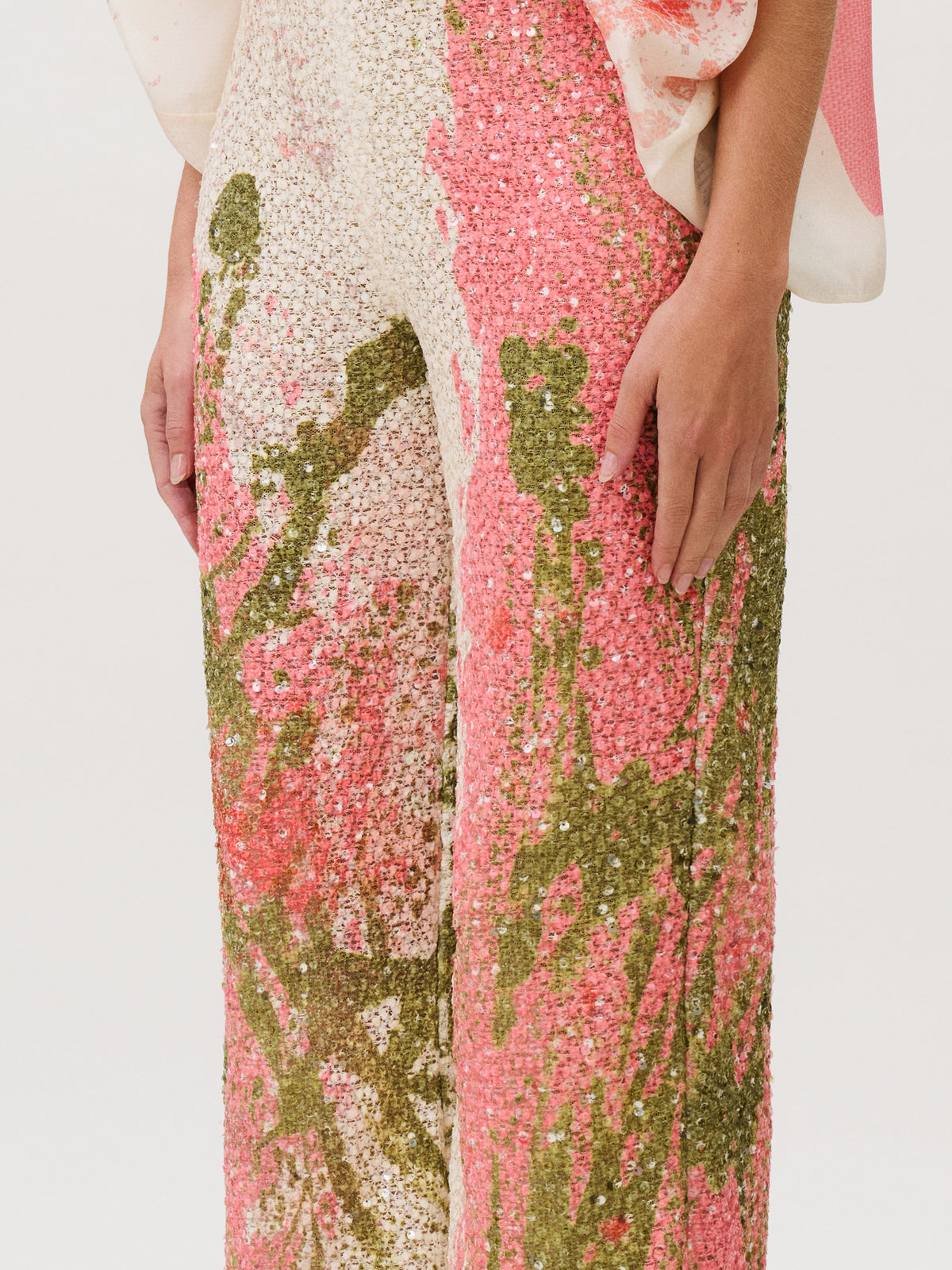 Como Pant wide-leg sequin pants featuring a pink and olive green abstract pattern, crafted from Italian fabric.