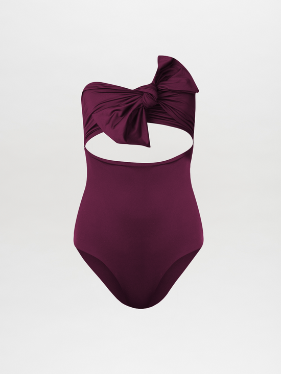 Costanzo One Piece Plum swimsuit with a cut-out design and a Silvia Tcherassi bow detail at the bust.