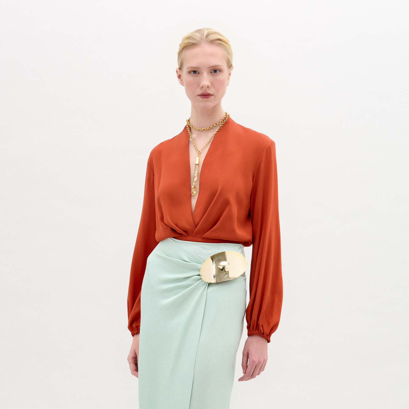 DELFINABLOUSE-TERRACOTA_FRONT_FALL2025