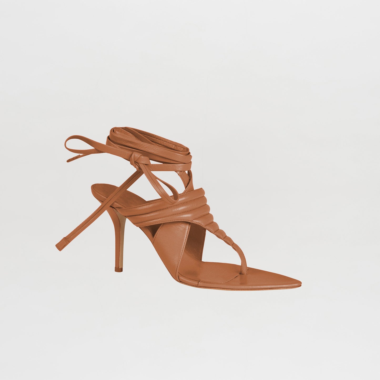 Dalila Heels Camel with a quilted toe-thong design, strappy upper, and ankle wrap laces in Italian calf leather, presented on a plain white background.