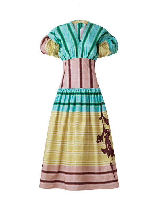 A Darice Dress Meadow View with puffed sleeves and a multicolor stripe pattern in shades of green, pink, and beige, featuring a floral design on the lower part, isolated on a white background.