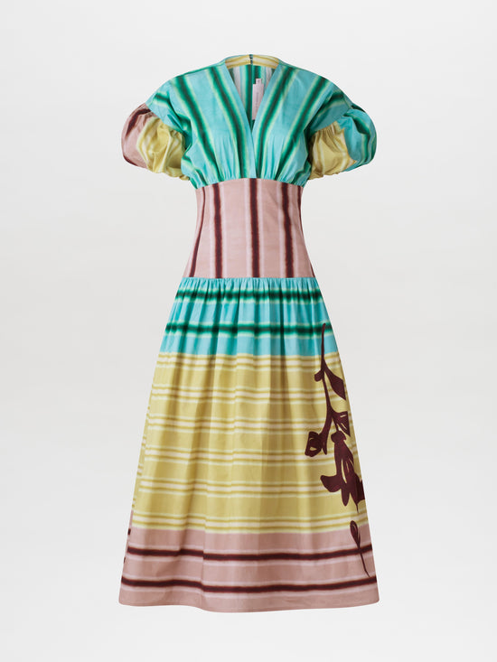 A Darice Dress Meadow View with puffed sleeves and a multicolor stripe pattern in shades of green, pink, and beige, featuring a floral design on the lower part, isolated on a white background.