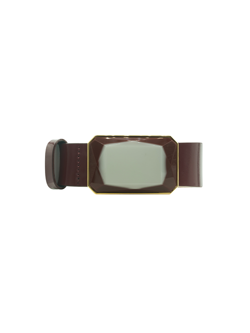 The Dora Belt Wine is a stylish brown belt featuring a large, rectangular, gem-like buckle centerpiece with a reflective surface and elegant gold trim, perfect for those who love the ship-inspired style.