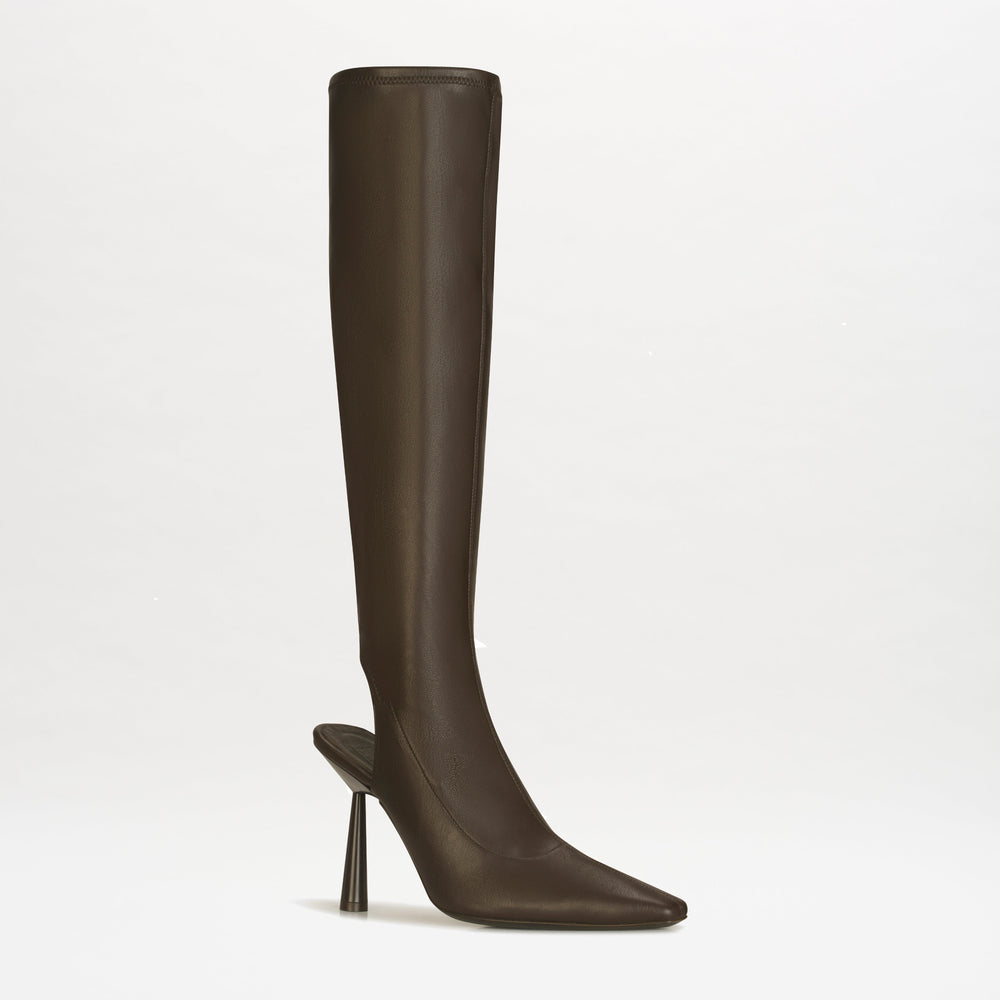 The Ember Boots, a single tall, dark brown Italian leather boot with an over-the-calf design, open heel, and pointed toe, is displayed against a plain white background.