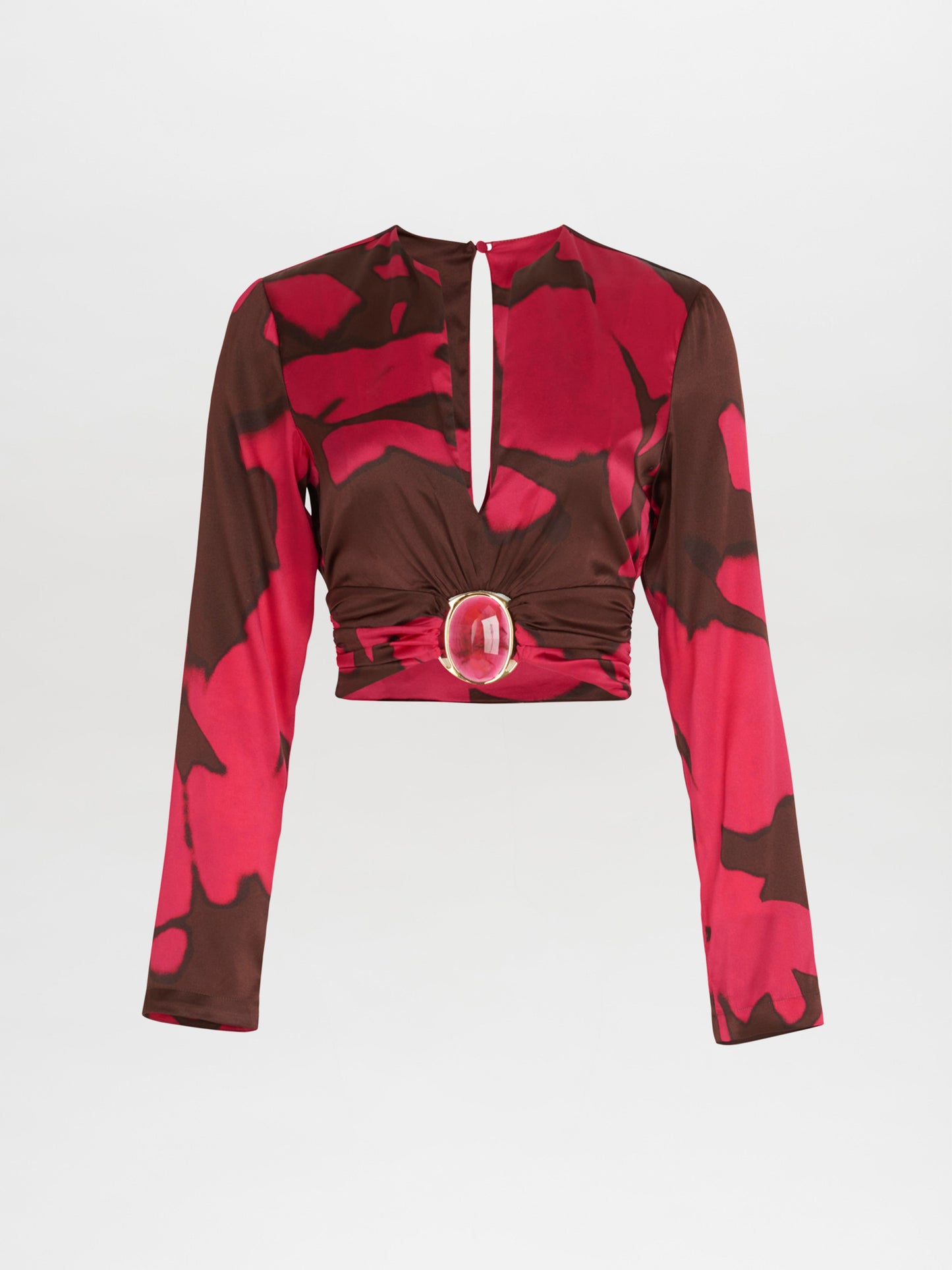 A pink and brown Edith Blouse Fuchsia Cacao with a belt, featuring an Italian resin detail.