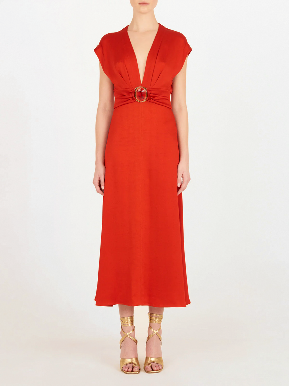 Emmeline Dress Rouge, with a belt that features a plunging neckline.