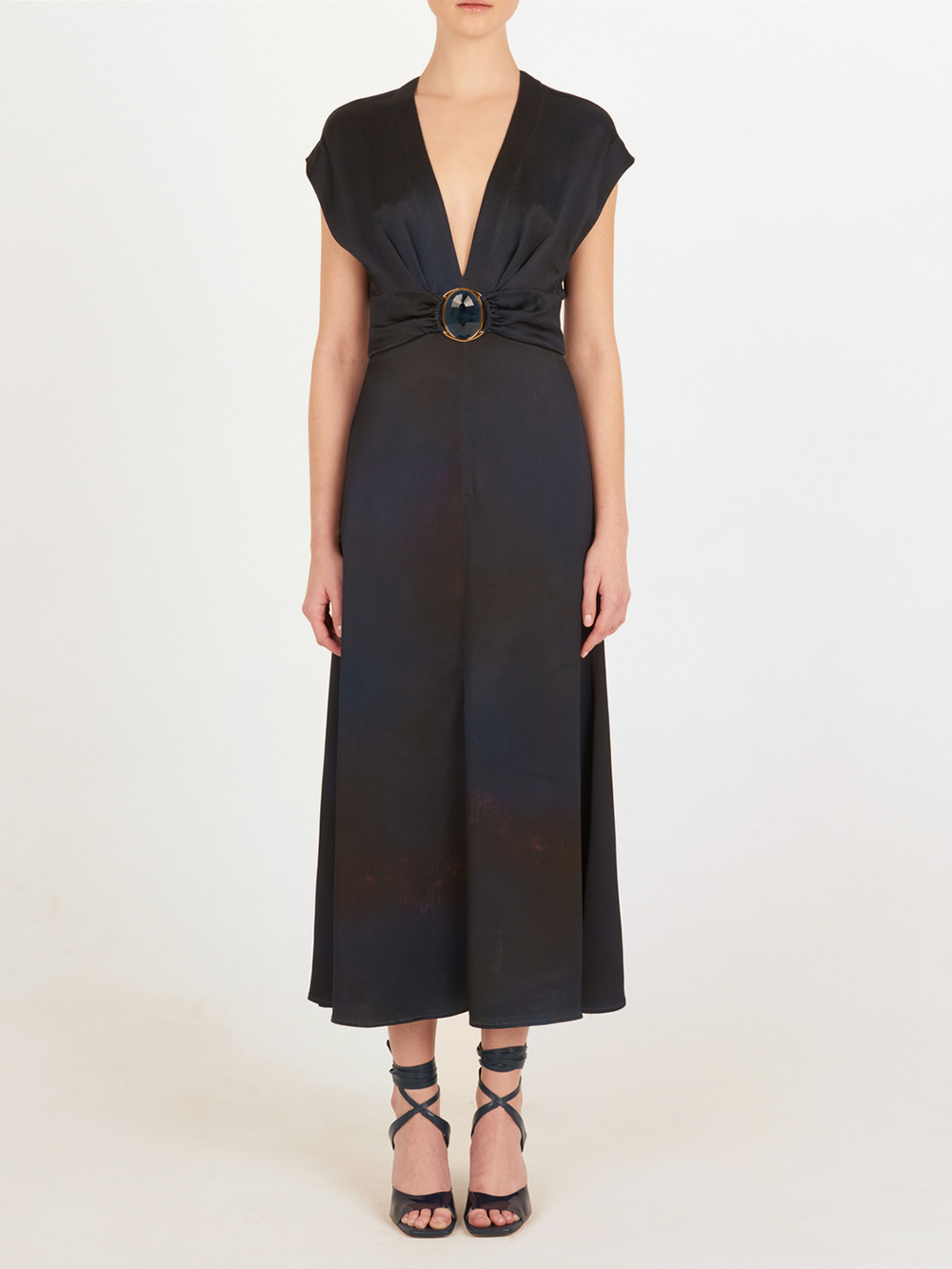 An elegant Emmeline Dress Navy with a buckle on the front.