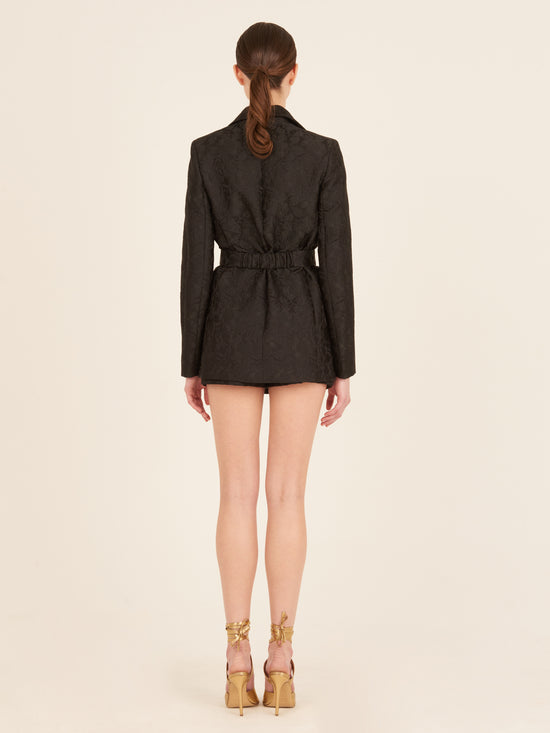 A structured Cuneo Jacket Black with a gold buckle detail.