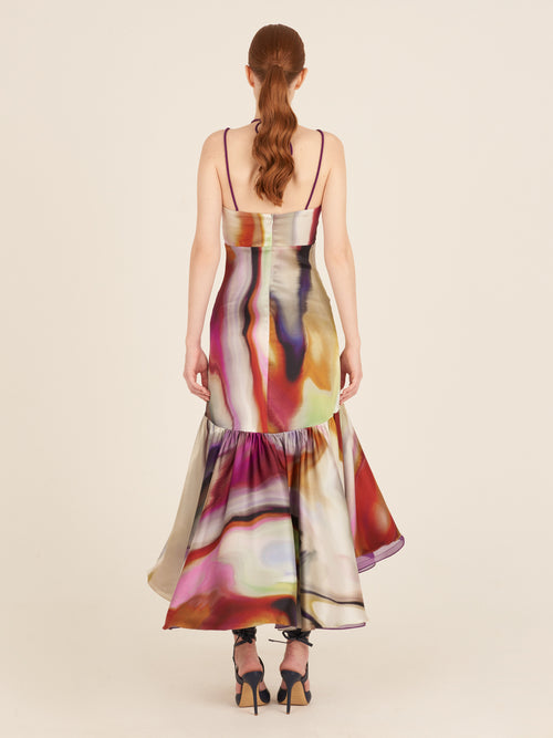 A Mogador Dress Iridescent Marble with a colorful print on it.