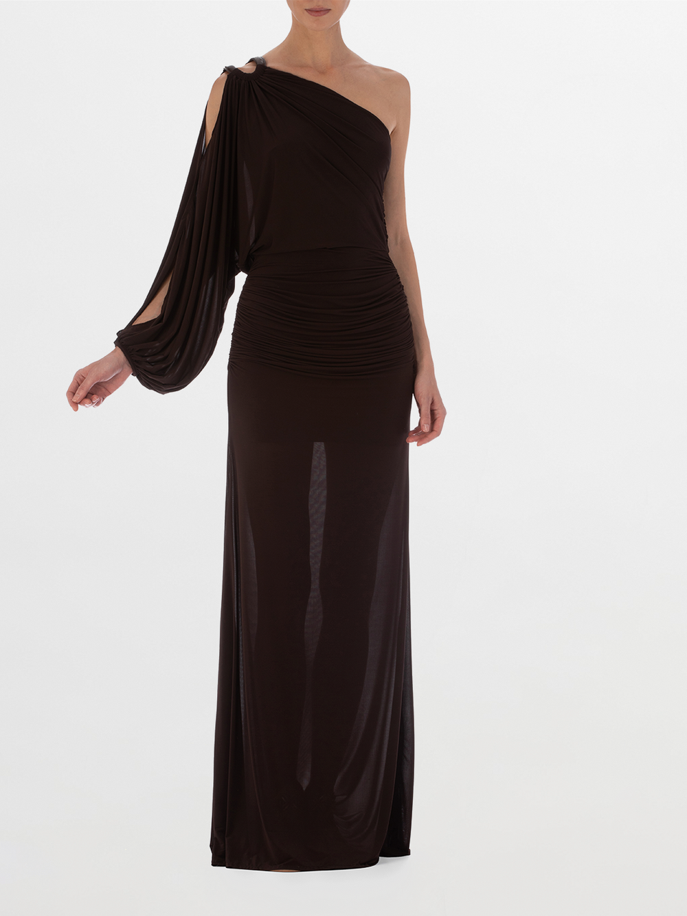 Woman in a Farah Dress Brown, a one-shoulder evening gown with leather ring detailing, posing in a studio setting.