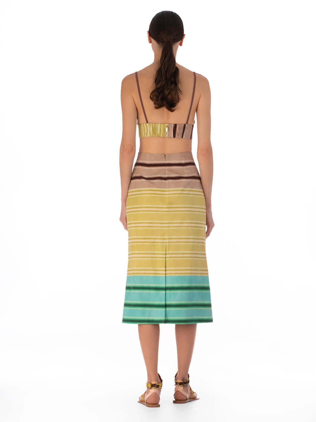 A-line high-waisted midi Atira Skirt Meadow View featuring horizontal multicolor stripes in brown, cream, yellow and teal, with a large brown floral print on the front.