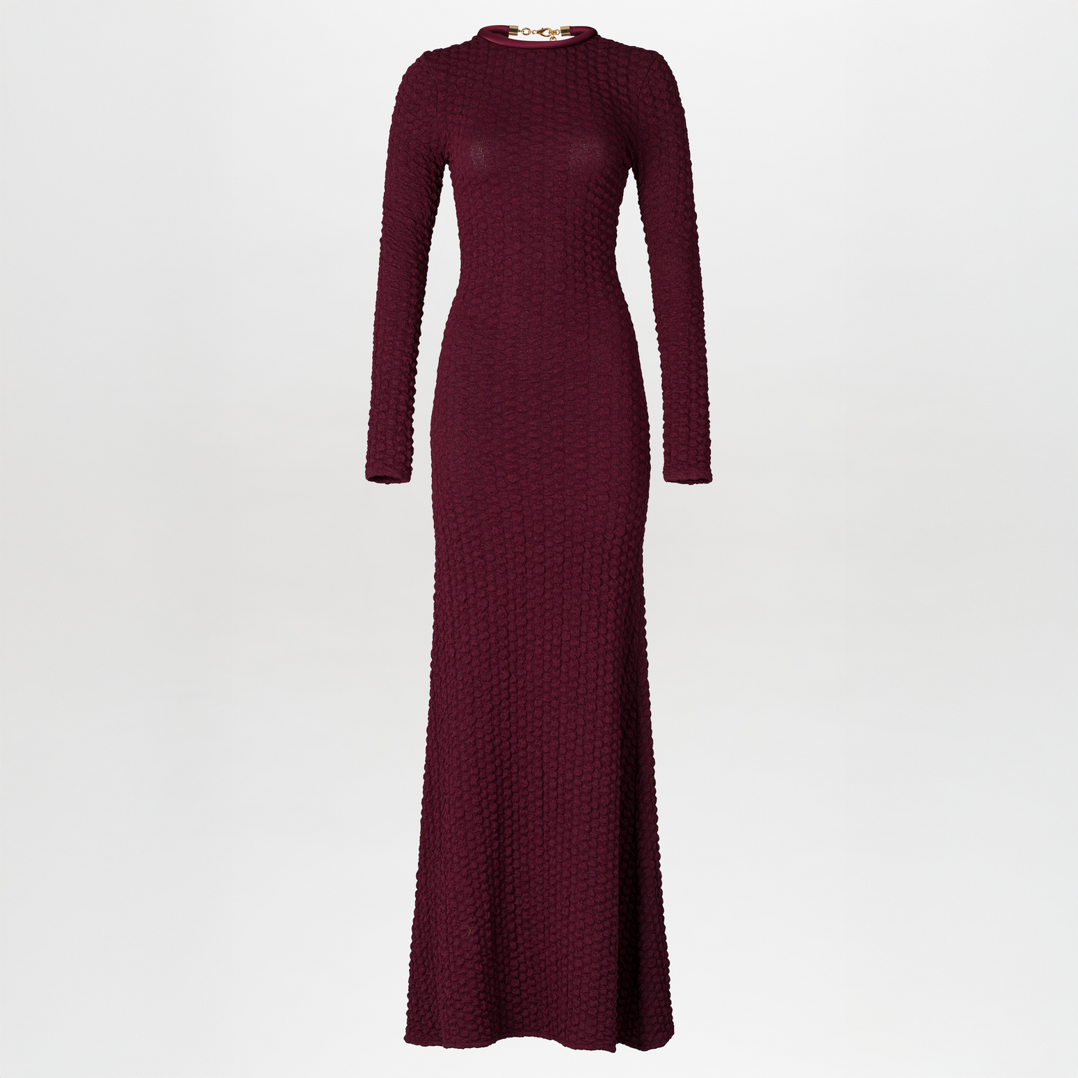 The model is wearing a pre-order Gabbice Dress Burgundy, set to ship by August 15th.