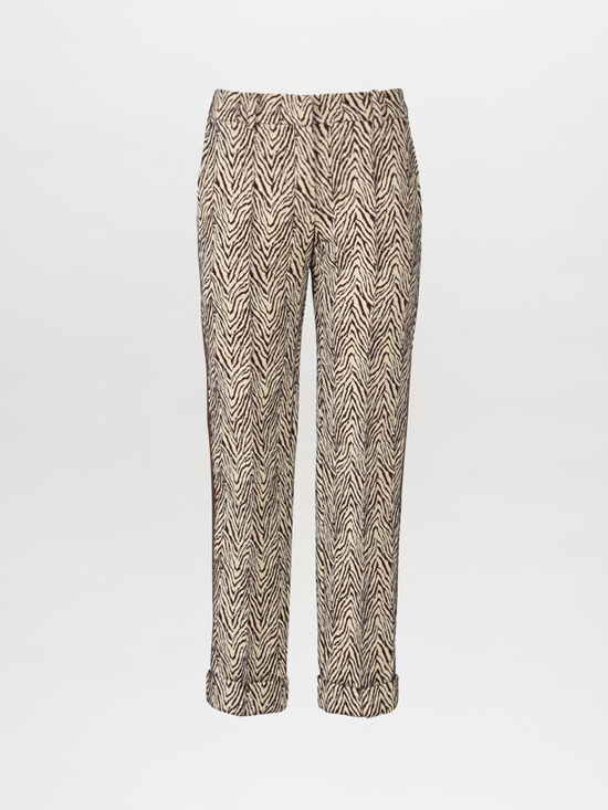 A pair of Garmet Pant Brown Zebra with a striking black and white zebra stripe pattern, featuring straight legs and small cuffs at the bottom.