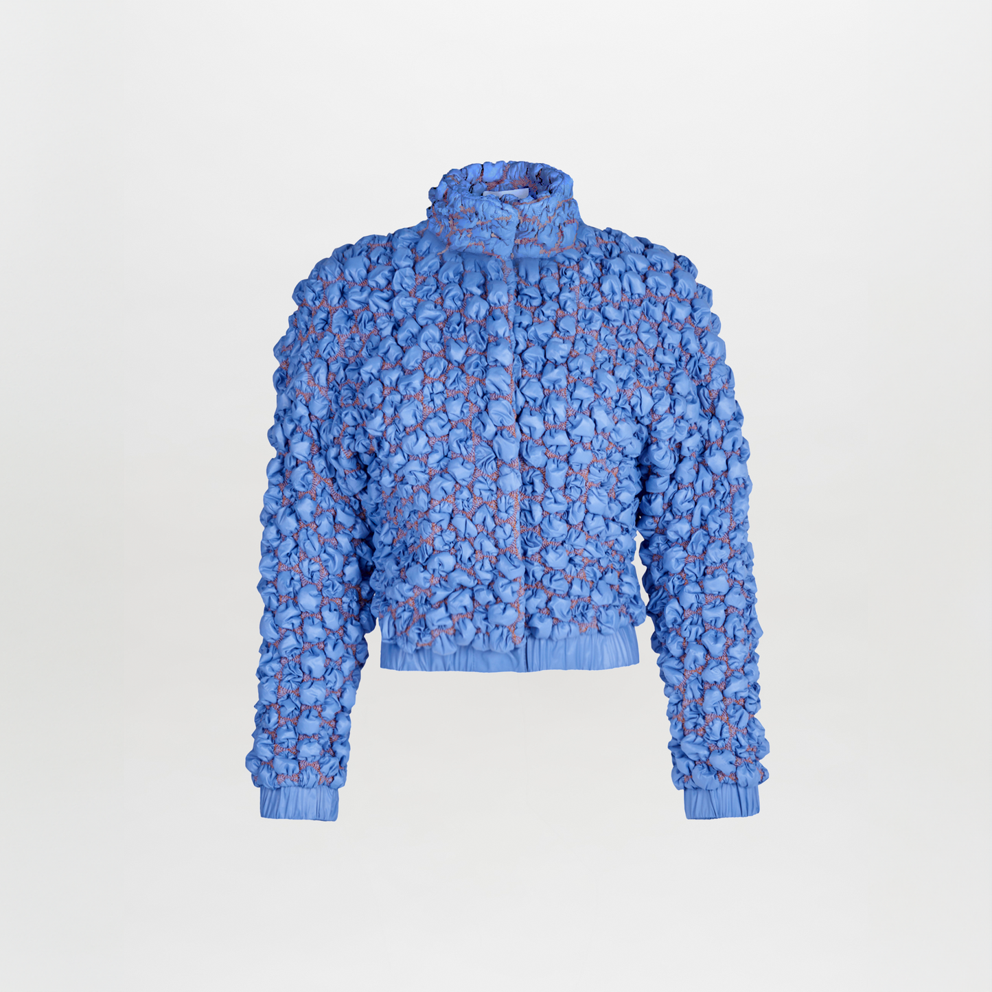 A Gieti Jacket Celeste with elastic cuffs on the sleeves.